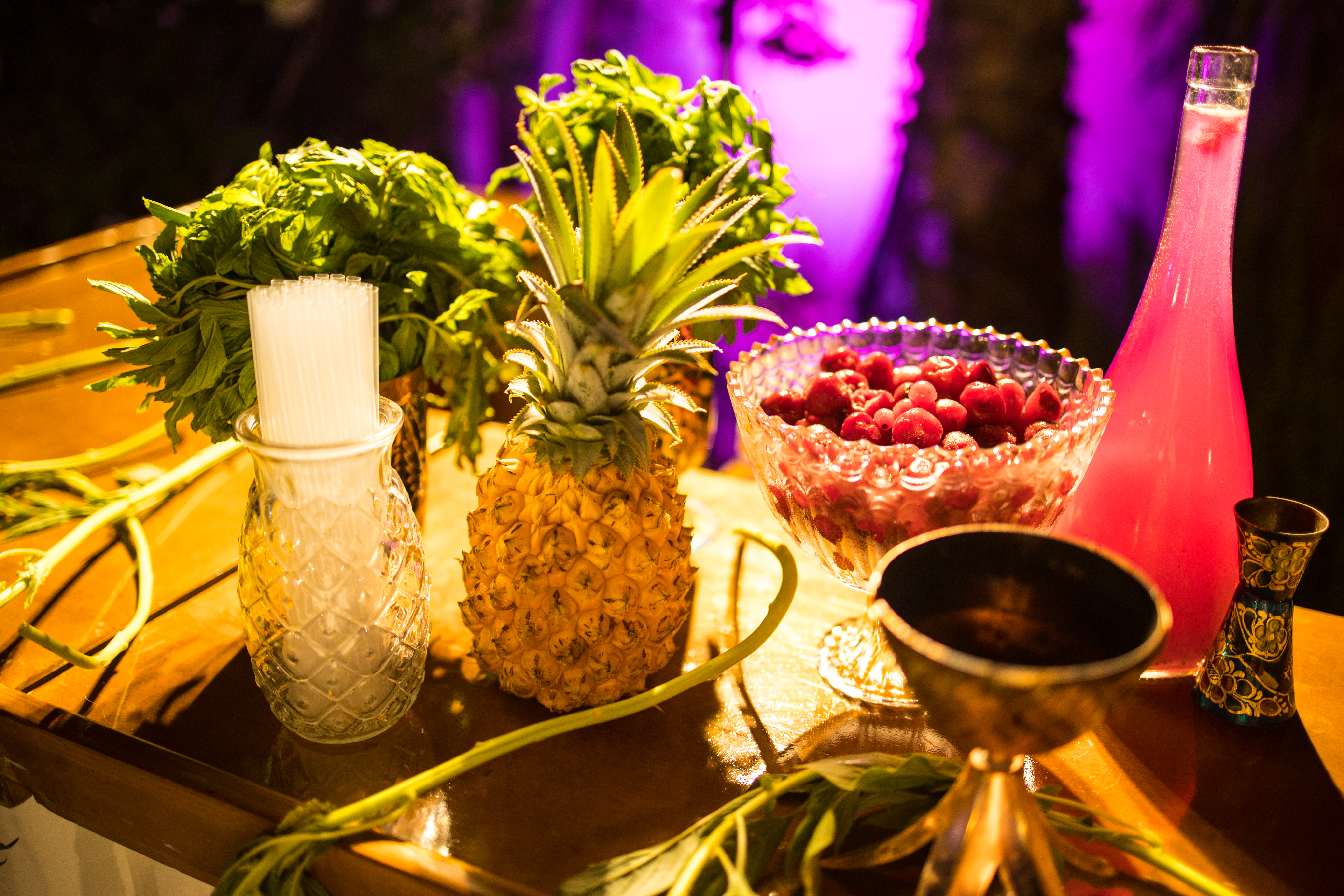 Colorful drinks and fresh fruit at an event